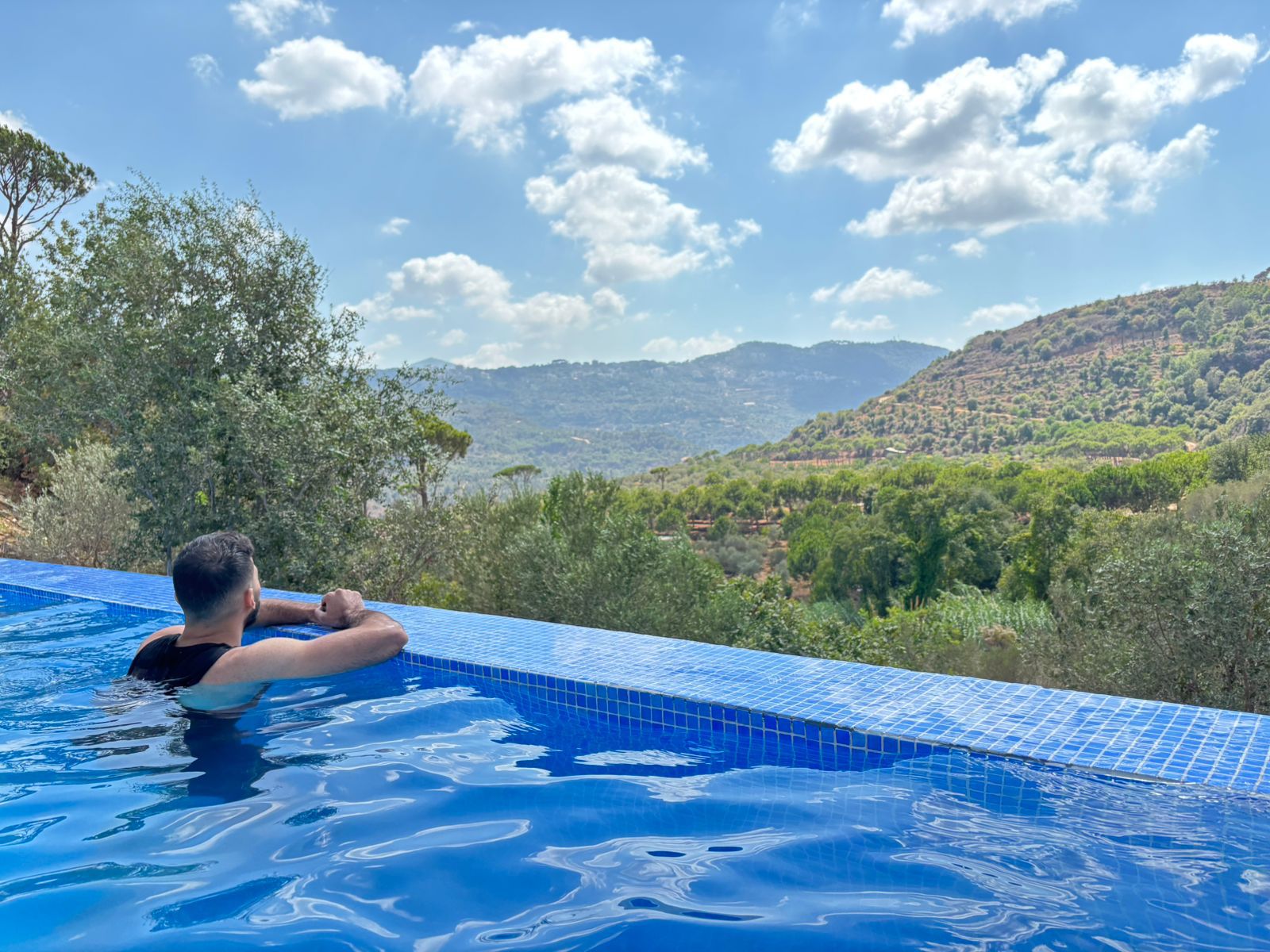 Outdoor infinity pool at sunset
